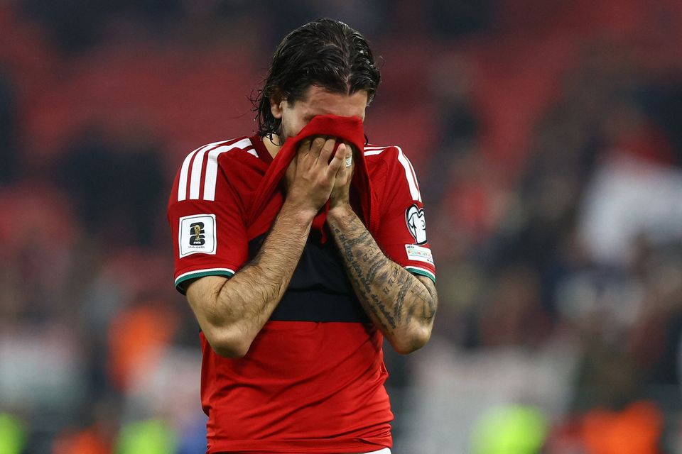 Hungary's Dominik Szoboszlai looks dejected after the match